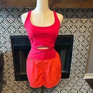 Free People Movement Righteous Runsie in the Flame or Flamingo Fizz Size L